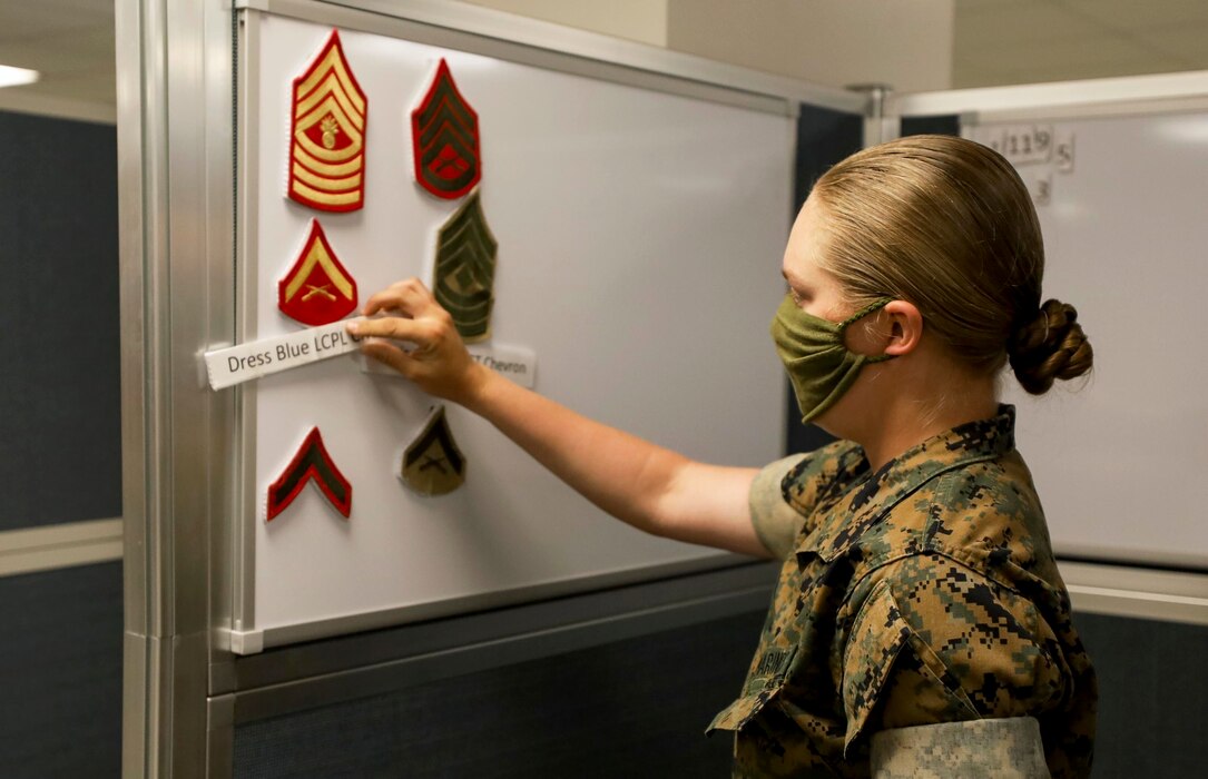 A U.S. Marine Corps recruit with Hotel Company, 2nd Recruit Training Battalion, answers a timed knowledge question during the final practical application test aboard Marine Corps Recruit Depot Parris Island, S.C., May 4, 2020. The recruits are tested on their performance while conducting combat casualty care, casualty carries and answering timed general Marine Corps knowledge. (U.S. Marine Corps photo by Lance Cpl. Samuel Fletcher)