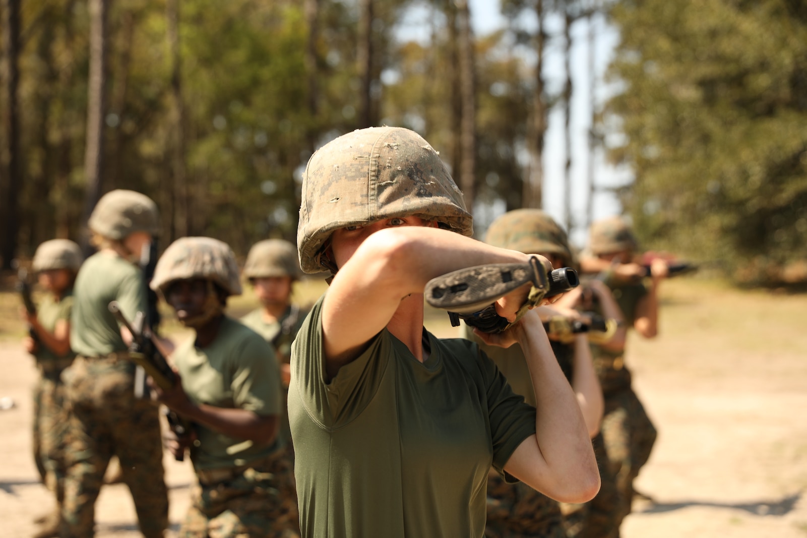 Recruits with Oscar Company, 4th Recruit Training Battalion, perform a horizontal buttstroke aboard Marine Corps Recruit Training Depot Parris Island, S.C., Mar. 14, 2020. The purpose of the Marine Corps Martial Arts Program is to execute unarmed and armed techniques to  use lethal and non-lethal force across a spectrum of violence.  (U.S. Marine Corps photos by Lance Cpl. Ryan Hageali)