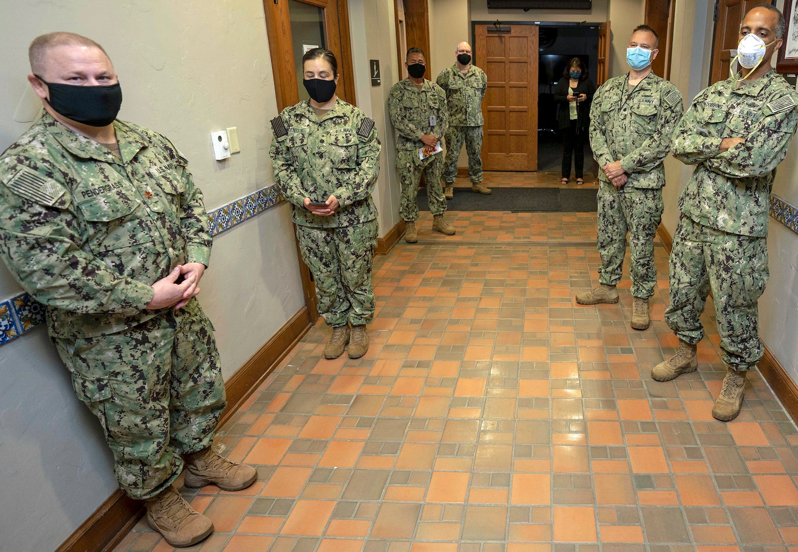 Navy Nurses assigned to Naval Medical Forces Support Command (NMFSC) attend a ceremony to honor the Navy Nurse Corps 112th birthday.