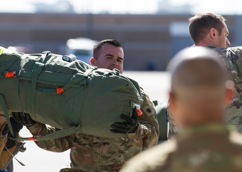 Soldiers assigned to the Utah National Guard's 1st Batallion, 211th Aviation Regiment, depart Roland R. Wright Air National Guard Base in Salt Lake City, Utah, May 7, 2020.