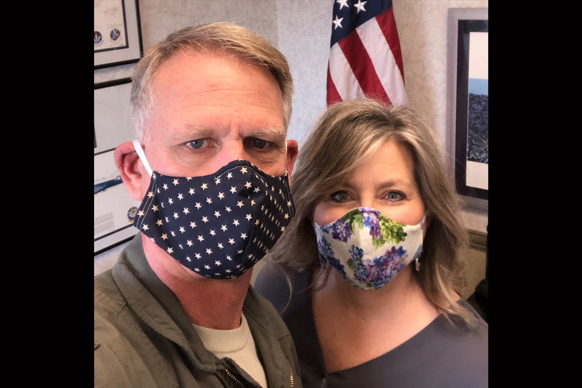 Col. Larry Shaw, 434th Air Refueling Wing commander and his wife Kris pose for a selfie wearing masks donated by Juanita Withrow, 434th ARW drug demand reduction program manager. Withrow has produced almost 900 face masks, all of which have been donated to Grissom Airmen and the local community. (U.S. Air Force photo/Col. Larry Shaw)