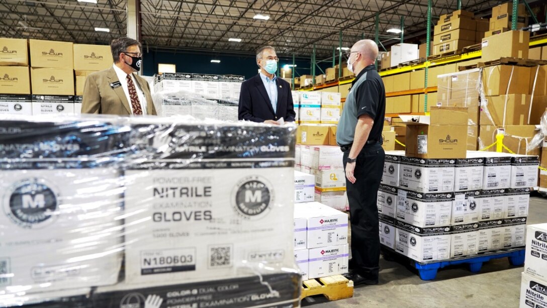 : Congressman Andy Harris visits the Federal Resources warehouse while workers pack personal protective equipment to be delivered to nursing homes May 7, 2020 in Stevensville, Maryland. The Defense Logistics Agency ordered $134 million of personal protective equipment which will be shipped to approximately 15,000 nursing homes around the U.S. in May and June. The equipment will provide medical staff members with 14-days’ worth of protective eyewear, medical gowns, masks and nitrite gloves. Under the direction of the White House Coronavirus Task Force, FEMA partnered with Federal Resources to coordinate the first of two shipments totaling a 14-day supply of PPE to more than 15,000 nursing homes across the Nation. (FEMA photo by Lameen Witter)