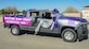 A vehicle rolls down a neighborhood street during the “Purple Up for Military Kids” car parade at Edwards Air Force Base, California, April 24. The parade was conducted to show appreciation and support for the base's children population. (Courtesy photo)