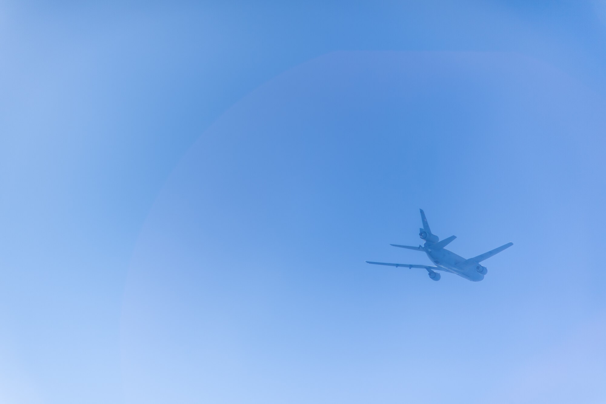 A KC-10 Extender operated by the 76th and 78th Air Refueling Squadron, 514th Air Mobility Wing, Joint Base McGuire-Dix-Lakehurst, N.J., flies over the Atlantic Ocean on May 13, 2020. The 514th performed their scheduled refuel missions in tandem with an #AmericaStrong flyover saluting and thanking all healthcare workers, first responders, and other essential personnel serving on the front lines of the fight against COVID-19. (U.S. Air Force photo by Tech. Sgt. Michael Hong)