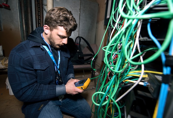 A photo of a commercial network administrator that goes with an EITaaS story.