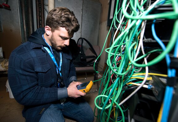 A photo of a commercial network administrator that goes with an EITaaS story.