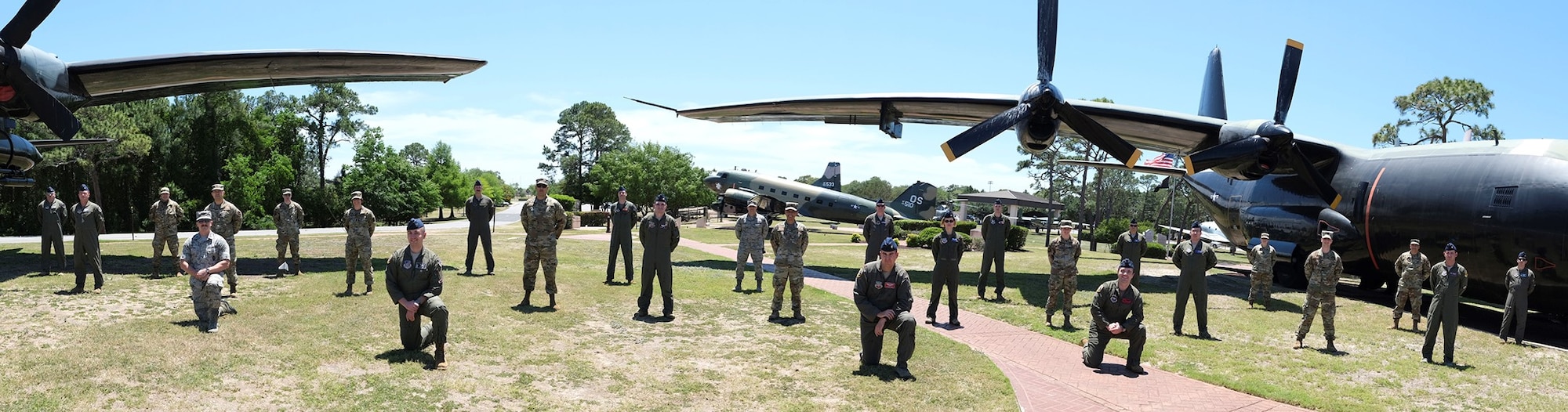27 Multi-Domain Warfare Officer Students pose for group photo with social distancing at the Hurlburt Field Air Park, Florida.