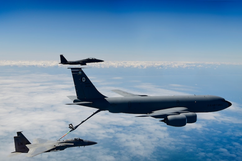 A KC-135 Stratotanker assigned to the 100th Air Refueling Wing conducts aerial operations with F-15 aircraft assigned to the 48th Fighter Wing in support of exercise Point Blank 20-02 over the North Sea, May 12, 2020. The joint event, held quarterly between the Royal Air Force and U.S. Air Forces stationed in the United Kingdom was the first to be conducted amid the COVID-19 pandemic. (U.S. Air Force photo/ Master Sgt. Matthew Plew)