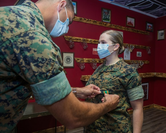 U.S. Marine is awarded a Navy and Marine Corps Achievement Medal at Camp Lejeune, N.C., May 8.