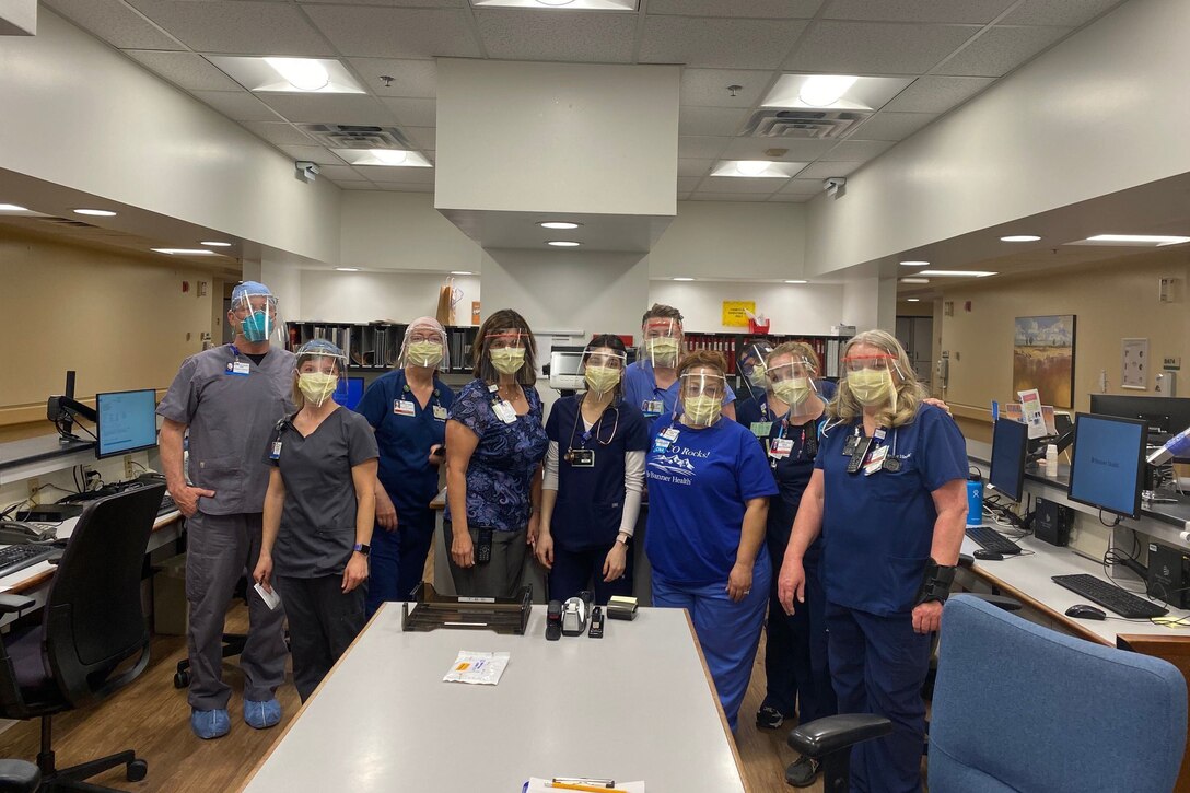 Health care workers posing for a photo.