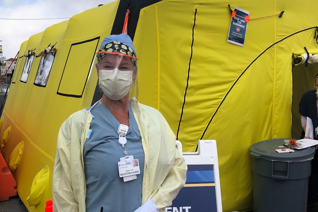 Nurse posing for a photo.