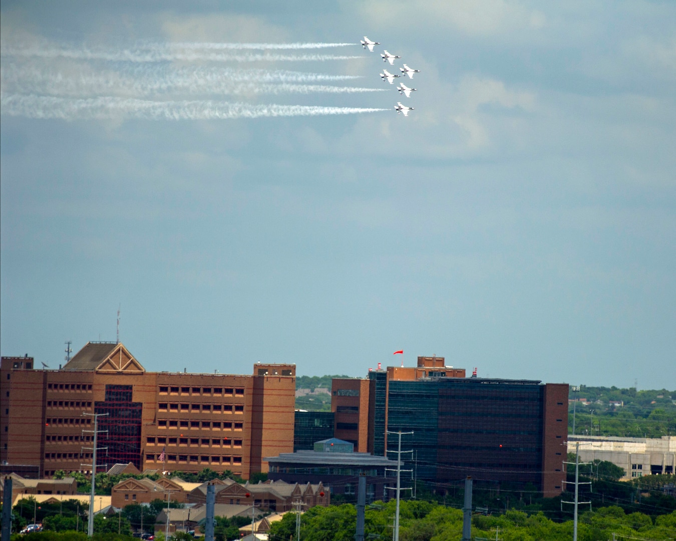 The United States Air Force Air Demonstration Squadron “Thunderbirds” fly over Brooke Army Medical Center at Joint Base San Antonio-Fort Sam Houston during their America Strong salute May 13.
