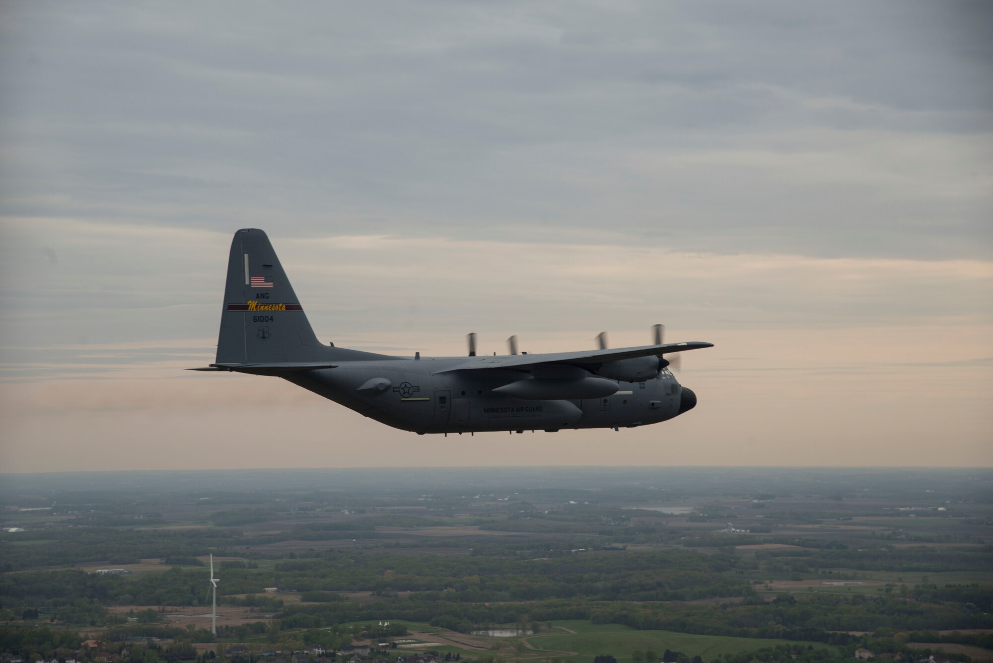 A U.S. Air Force C-130 from the 133rd Airlift Wing flies with a C-130 from the 934th Airlift Wing during a flyover in Minnesota, May 13, 2020. The 934th Airlift Wing along with the Minnesota National Guard’s 133rd Airlift Wing flew statewide flyovers in recognition of those on the frontlines of the COVID-19 pandemic response as part of Operation American Resolve. (U.S. Air Force photo by Chris Farley)