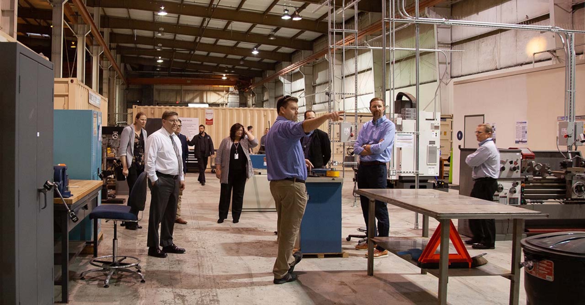 Naval Surface Warfare Center, Port Hueneme Division’s Office of Research and Technology Applications Manager Alan Jaeger, center, leads a group that includes visitors from the Department of Navy’s NavalX program on a tour of the Fathomwerx innovation lab at the Port of Hueneme, Jan. 27. Fathomwerx was created in partnership with the port, the Ventura County Economic Development Collaborative and Camarillo, Calif.-based Matter Labs. Fathomwerx is now one of the Navy’s new NavalX Tech Bridges.