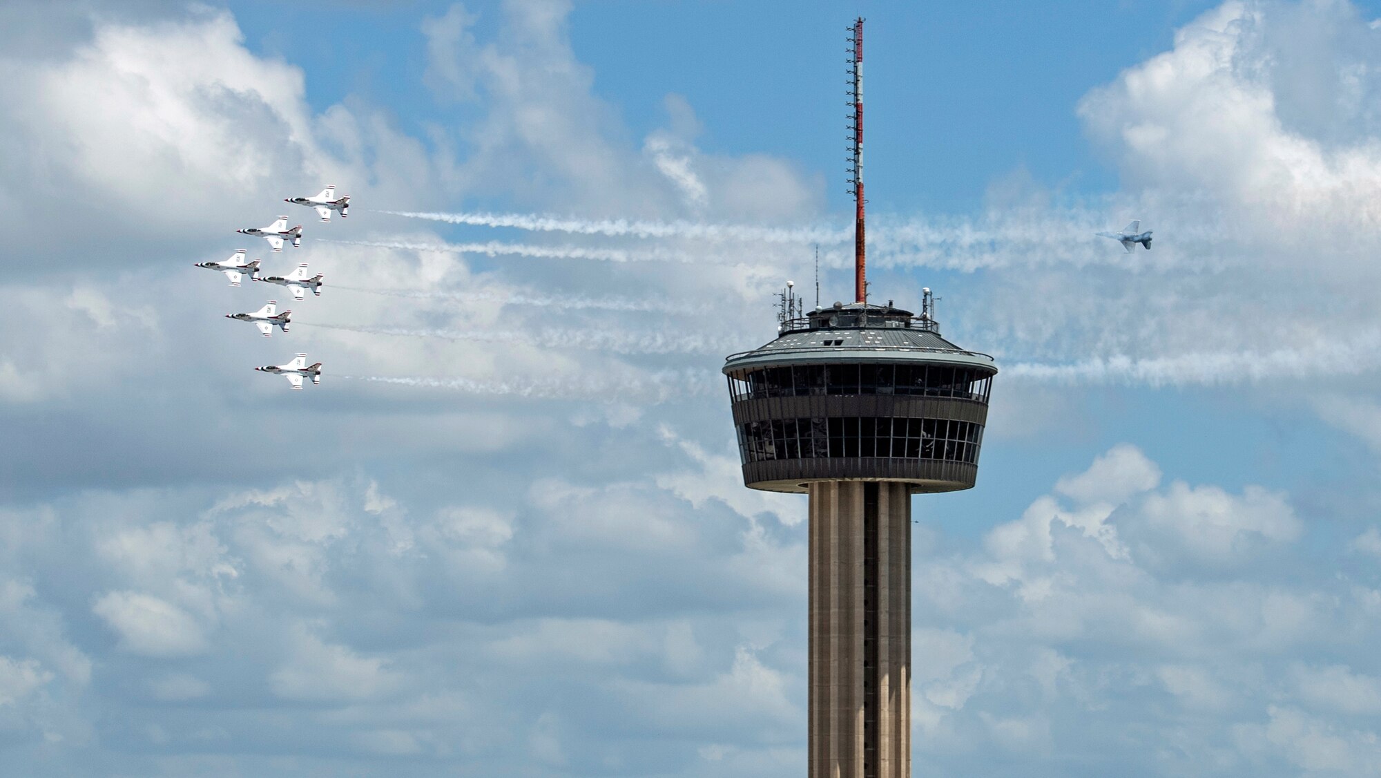 The United States Air Force Air Demonstration Squadron “Thunderbirds” fly in formation over San Antonio as part of Operation America Strong May 13.