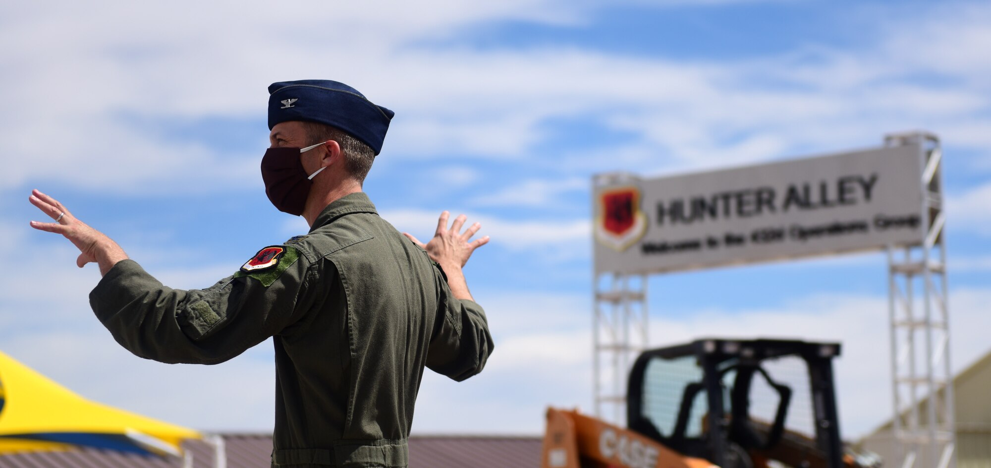 Col. Stephen Jones, 432nd Wing/432nd Air Expeditionary Wing commander, addresses wing and construction personnel regarding development of  the 732nd Operations Group campus at Creech Air Force Base, Nevada, May 11, 2020.