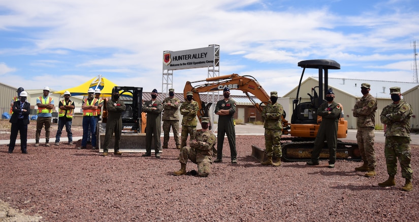 Contractors and wing leadership stand at the construction site for the 732nd Operations Group’s newest facilities at Creech Air Force Base, Nevada, May 11, 2020.
