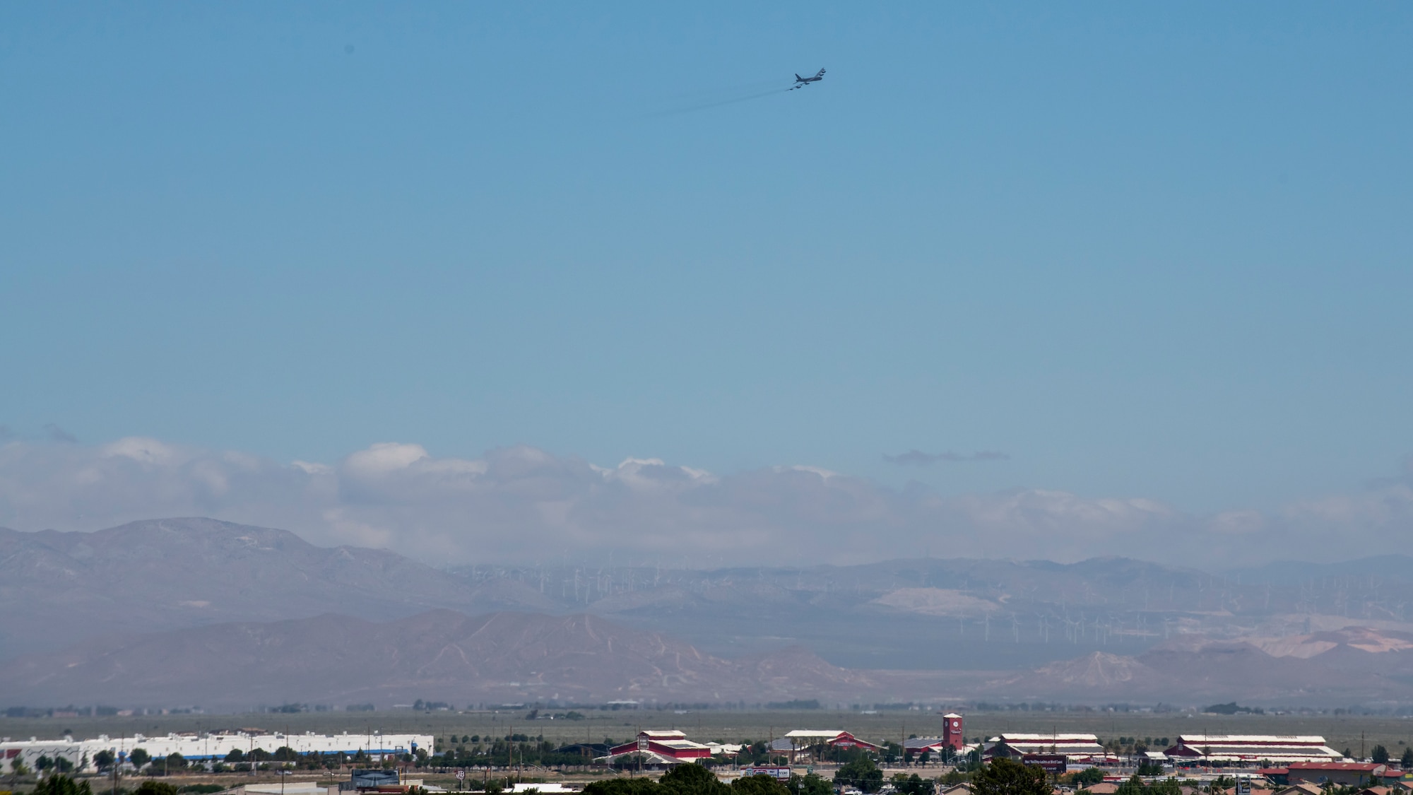 A B52 Stratofortress from the 412th Test Wing out of Edwards Air Force Base, California, flies over the Antelope Valley communities of Lancaster and Palmdale in northern Los Angeles County, May 14. The flyover is in honor of, and to show gratitude to the front-line health care workers helping fight the COVID-19 pandemic in the Antelope Valley, also referred to as the Aerospace Valley. (Air Force photo by Giancarlo Casem)