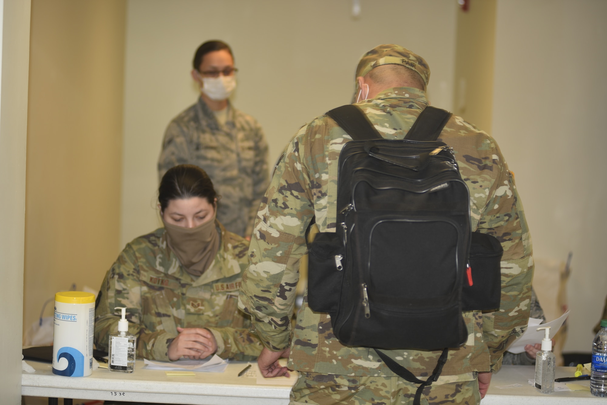 Photo of an individual in-processing to the base.