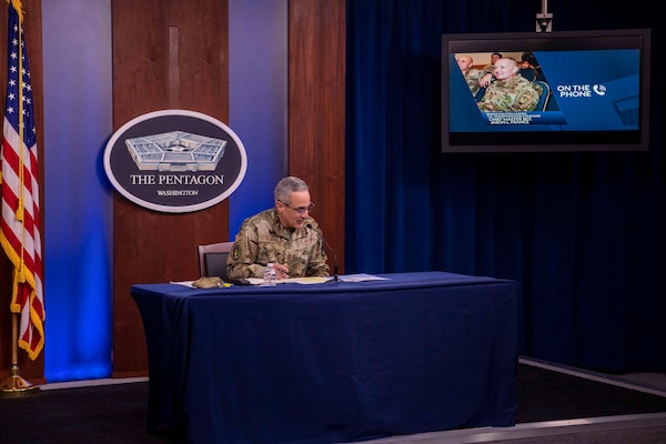 Senior Enlisted Advisor to the Chairman Ramón “CZ” Colón-López sits on a stage.