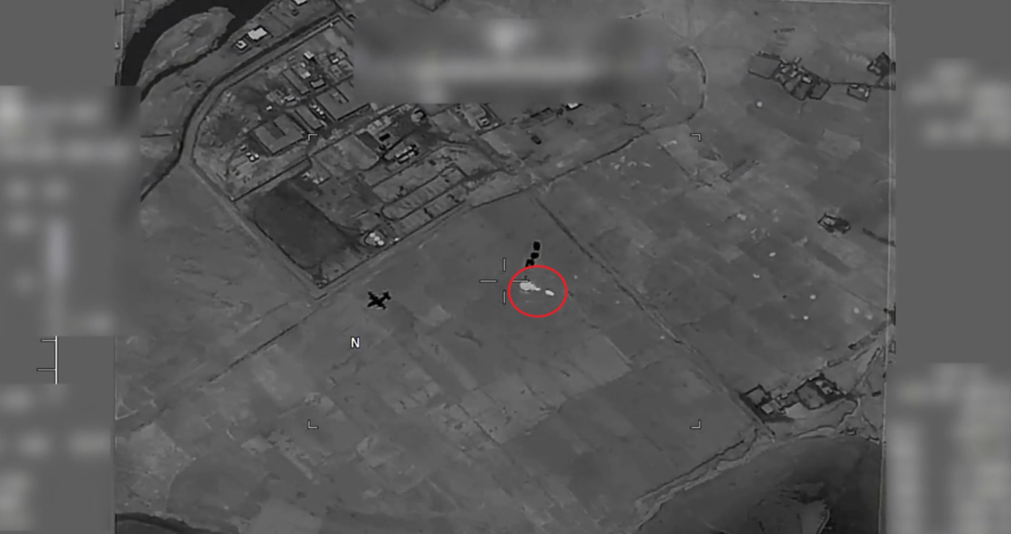 A screengrab depicts a rocket-propelled grenade, circled in red, launching towards a C-130J Super Hercules aircraft as it airdrops cargo at an undisclosed location in Afghanistan, Sept. 2019.