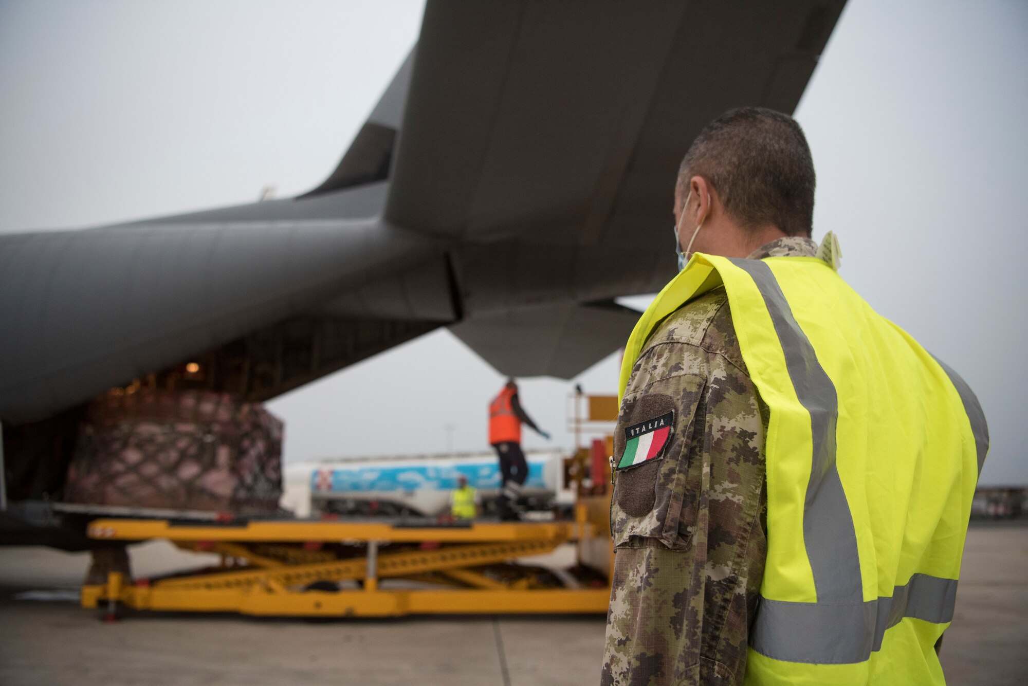 man looks at cargo