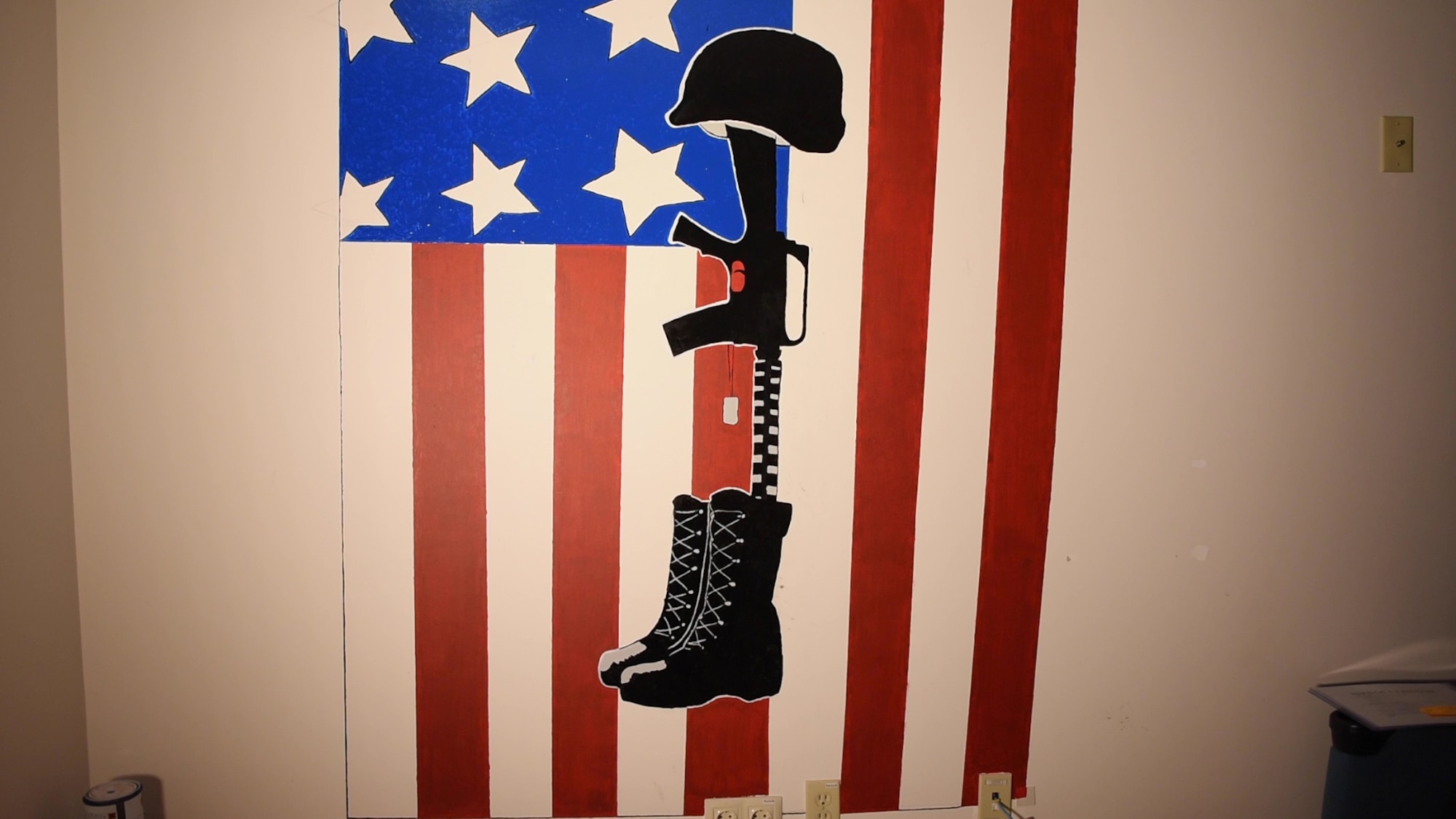 A freshly-painted mural adorns the wall of a dormitory building May 10, 2020, at Incirlik Air Base, Turkey. The mural commemorates security forces Airmen who paid the ultimate sacrifice in service to our nation. (U.S. Air Force photo by Staff Sgt. Joshua Magbanua)