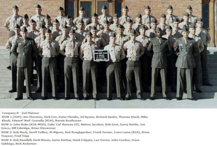 Five lines of men in uniform stand for an official photo.