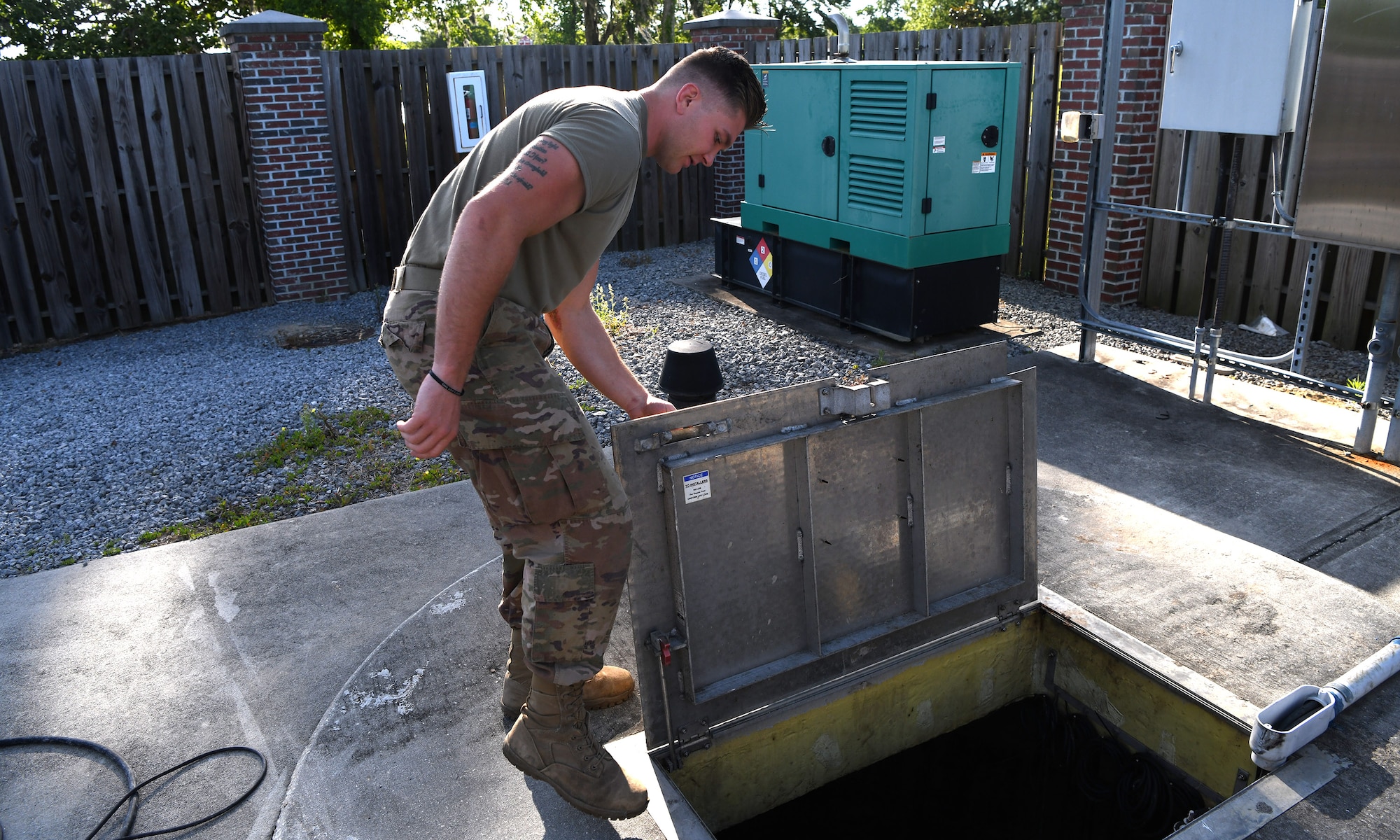 Senior Airman Logan Smith, 628th Civil Engineering Squadron water and fuels systems maintenance specialist, inspects a septic pump system used to ensure waste is properly disposed of on Joint Base Charleston, S.C., May 12, 2020. Water and fuel systems maintenance specialists manage the plumbing, wastewater collection systems, liquid fuel storage and natural gas distribution systems on every base. This maintenance can include the waste systems that keep bases clean and sanitary. Water and fuel system maintainers have kept up operations during the COVID-19 physical distancing posture in order to ensure base cleanliness and the health and wellness of our JB Charleston teammates.