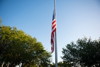 The  U.S. flag is flown at half mast in recognition of Peace Officers Memorial Day on Joint Base Charleston, S.C., May 15, 2020. Peace Officers Memorial Day is an observance that pays tribute to local, state and federal peace officers that have died, or have been disabled in the line of duty.