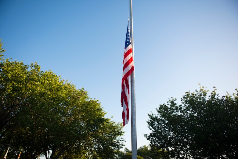 The  U.S. flag is flown at half mast in recognition of Peace Officers Memorial Day on Joint Base Charleston, S.C., May 15, 2020. Peace Officers Memorial Day is an observance that pays tribute to local, state and federal peace officers that have died, or have been disabled in the line of duty.