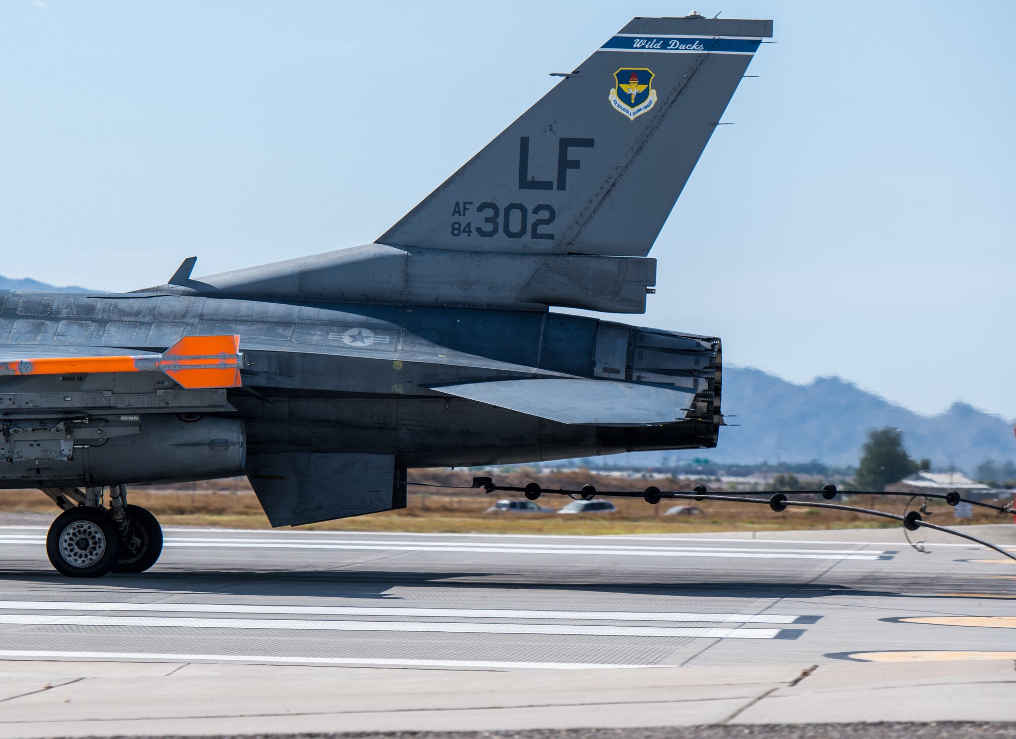An F-16C Fighting Falcon assigned to the 309th Fighter Squadron catches an emergency cable during an annual drill to recertify the BAK-12 arresting system May 8, 2020, at Luke Air Force Base, Ariz.