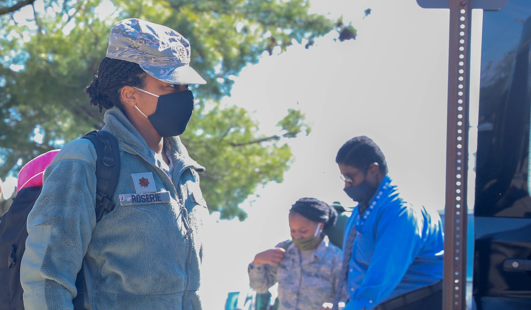 U.S. Air Force Maj. Melanie Roserie, social worker, 59th Medical Group, Randolph Air Force Base, Texas, boards a van at Joint Base McGuire-Dix-Lakehurst, NJ, April 28, 2020. Roserie is a part of a six-member team that will provide behavioral health and support services to the service men and women that are provide care and medical services to COIVD-19 patients. U.S. Northern Command, through U.S. Army North, is providing military support to the Federal Emergency Management Agency to help communities in need. (U.S. Army photo by Sgt. Aimee Nordin)