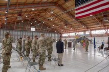 49th Wing Airmen render salutes during the National Anthem at the 49th Maintenance Group Change of Command ceremony May 15, 2020, on Holloman Air Force Base, N.M. Col. Joseph Campo, 49th WG commander, presided over the ceremony, at which Col. Tim Harbor, outgoing 49th MXG commander, relinquished command to Col. Thomas Preston, incoming 49th MXG commander. (U.S. Air Force photo by Staff Sgt. Christine Groening)