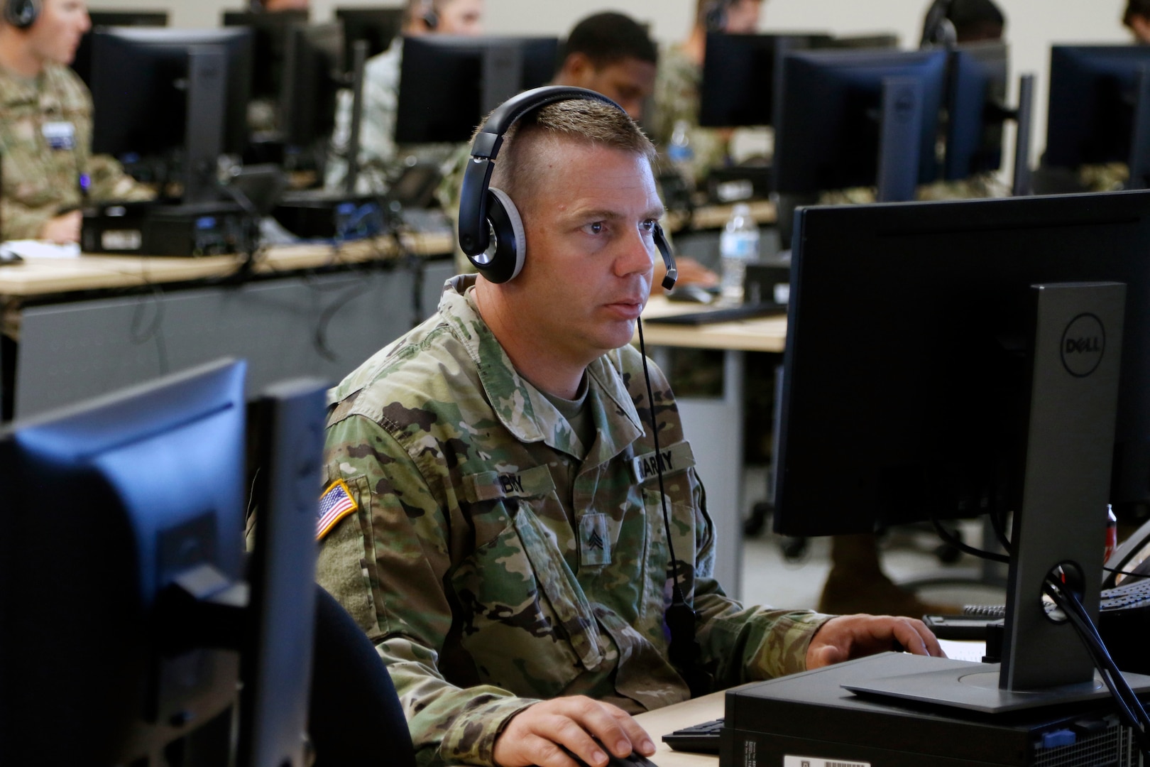 Soldiers with the 116th Army Band, Georgia Army National Guard, along with Airmen from both the 116th Airlift Wing and 165th Air Control Wing, operate a call center that helps facilitate testing through the Augusta University ExpressCare cellphone app. The Soldiers in the call center pull information from a database pool and help people experiencing possible COVID-19 symptoms find testing sites near them.