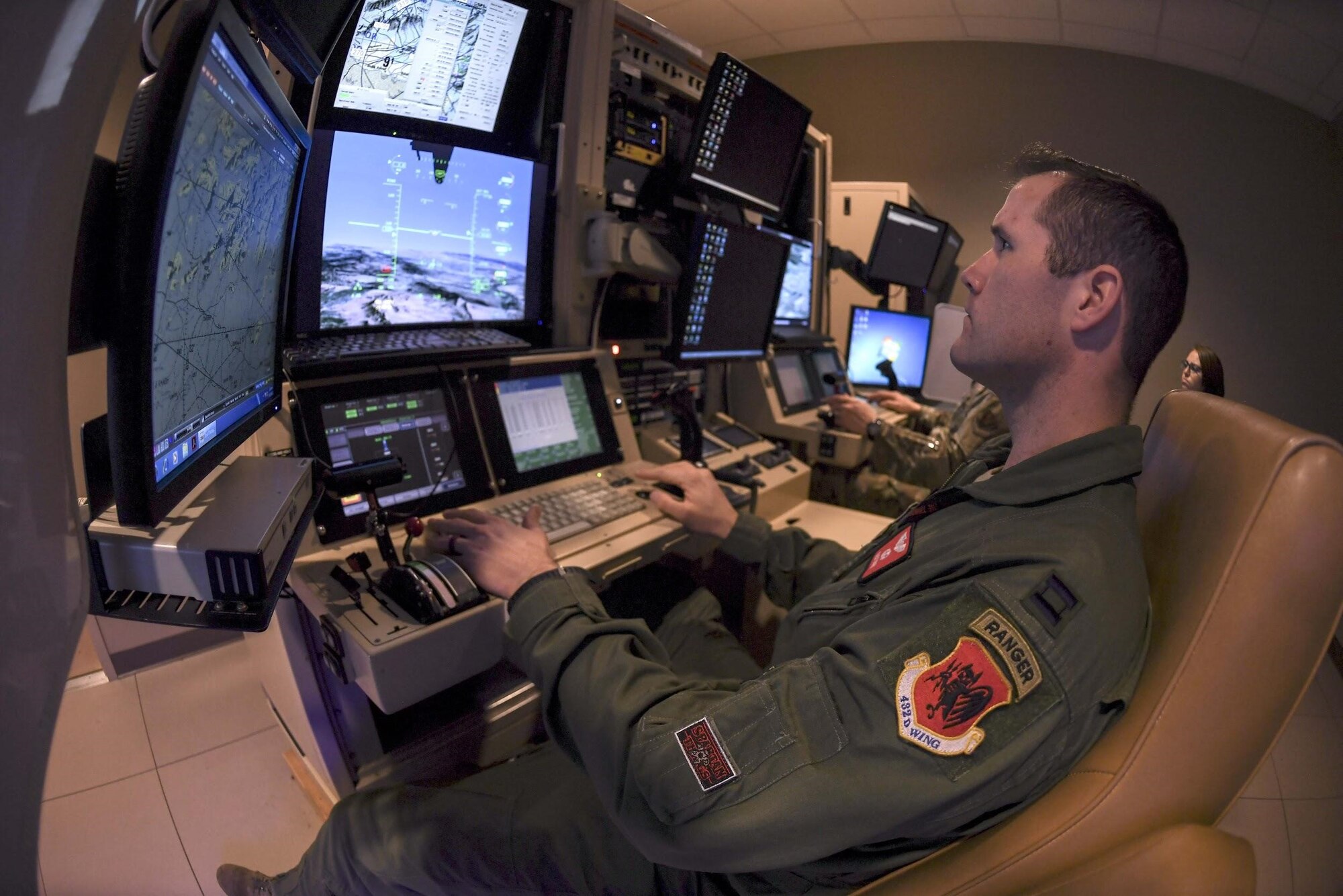 MQ-9 Reaper pilot sits in flight simulator