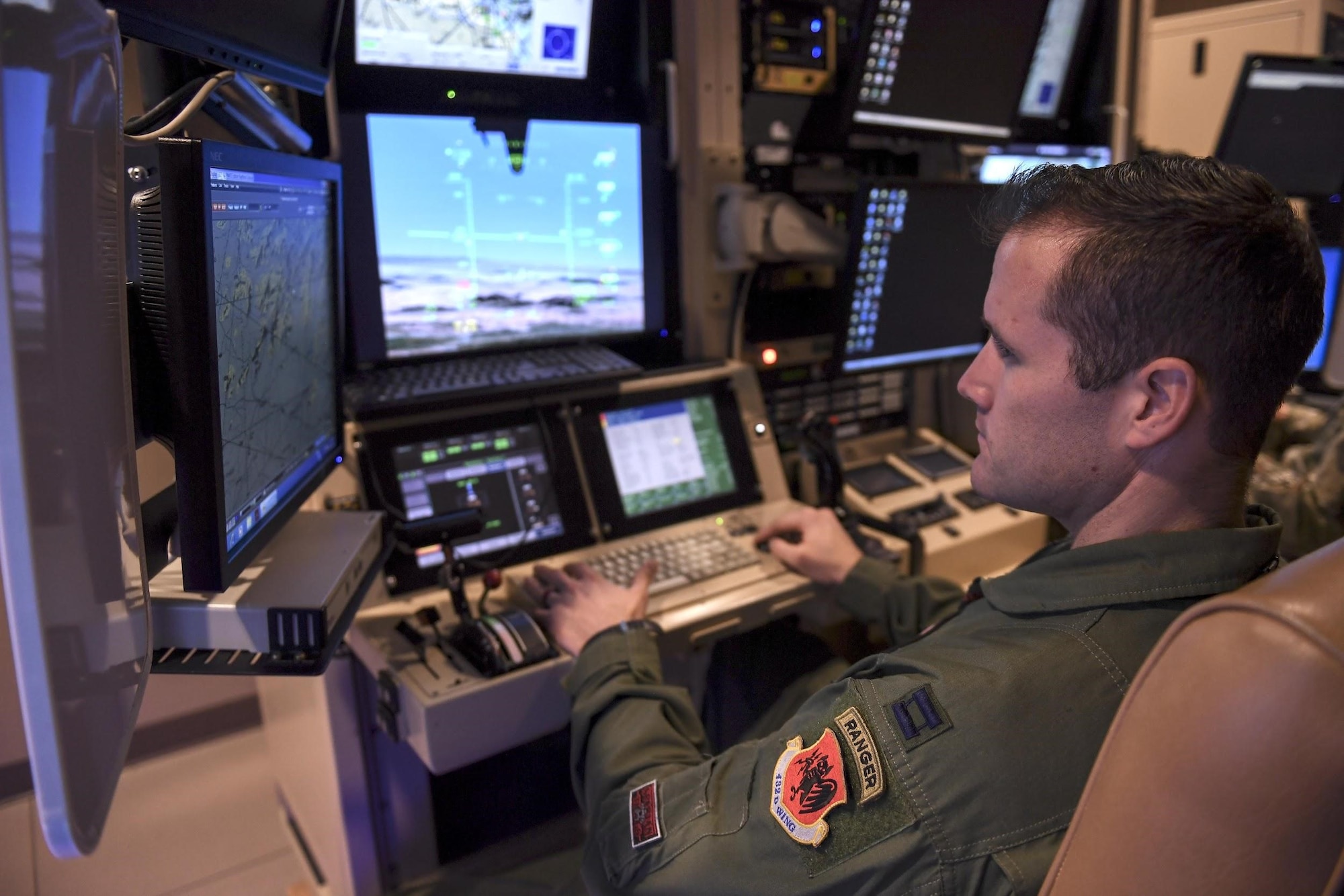 MQ-9 Reaper pilot sits in flight simulator