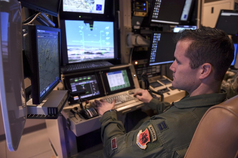 MQ-9 Reaper pilot sits in flight simulator