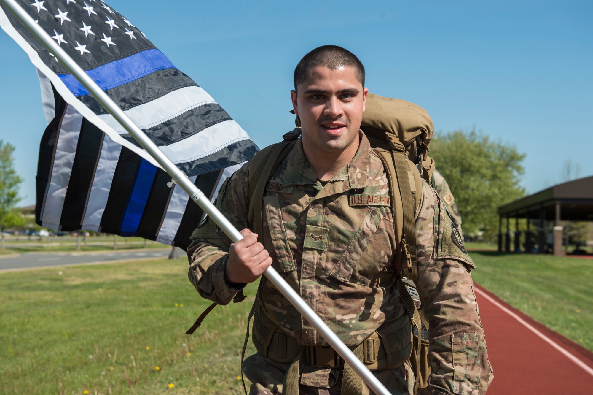 Airman 1st Class Conner Prasad, 321st Contingency Response Squadron defender, takes part in a 24-hour ruck march to remember fallen defenders May 15, 2020 at Joint Base McGuire-Dix-Lakehurst, N.J. The ruck march is organized into shifts and is part of an annual event held during police week. (U.S. Air Force photo by Staff Sgt. Sarah Brice)