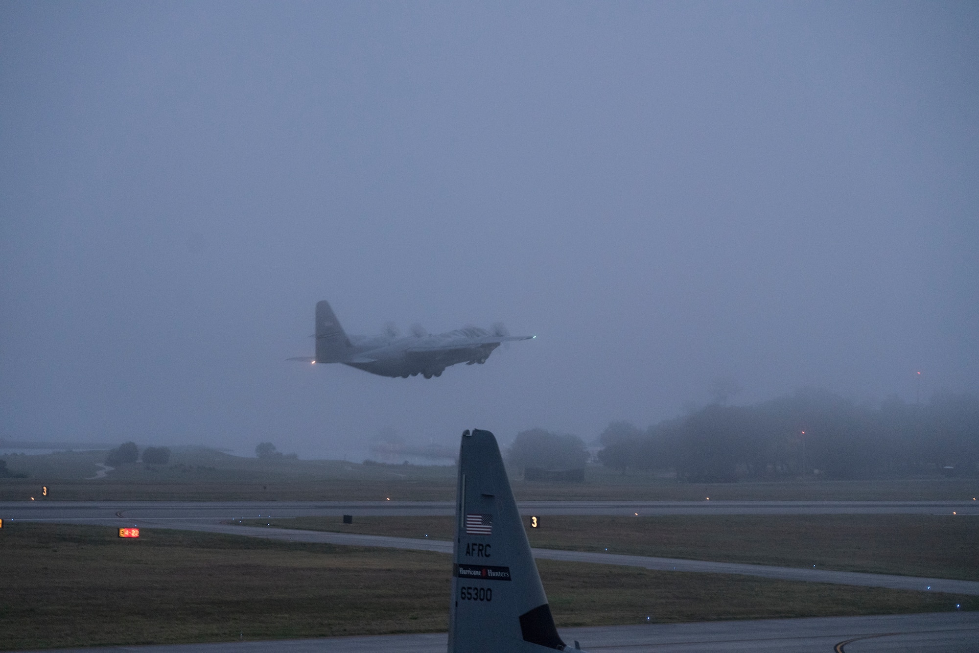 A WC-130J Super Hercules aircraft from 53rd Weather Reconnaissance Squadron takes off May 16, at Keesler Air Force Base, Miss. The Hurricane Hunters departed today on their first storm tasking of the 2020 Atlantic hurricane season to investigate an area for possible development into a tropical depression or storm near the Bahamas. (U.S. Air Force photo by Tech. Sgt. Christopher Carranza)