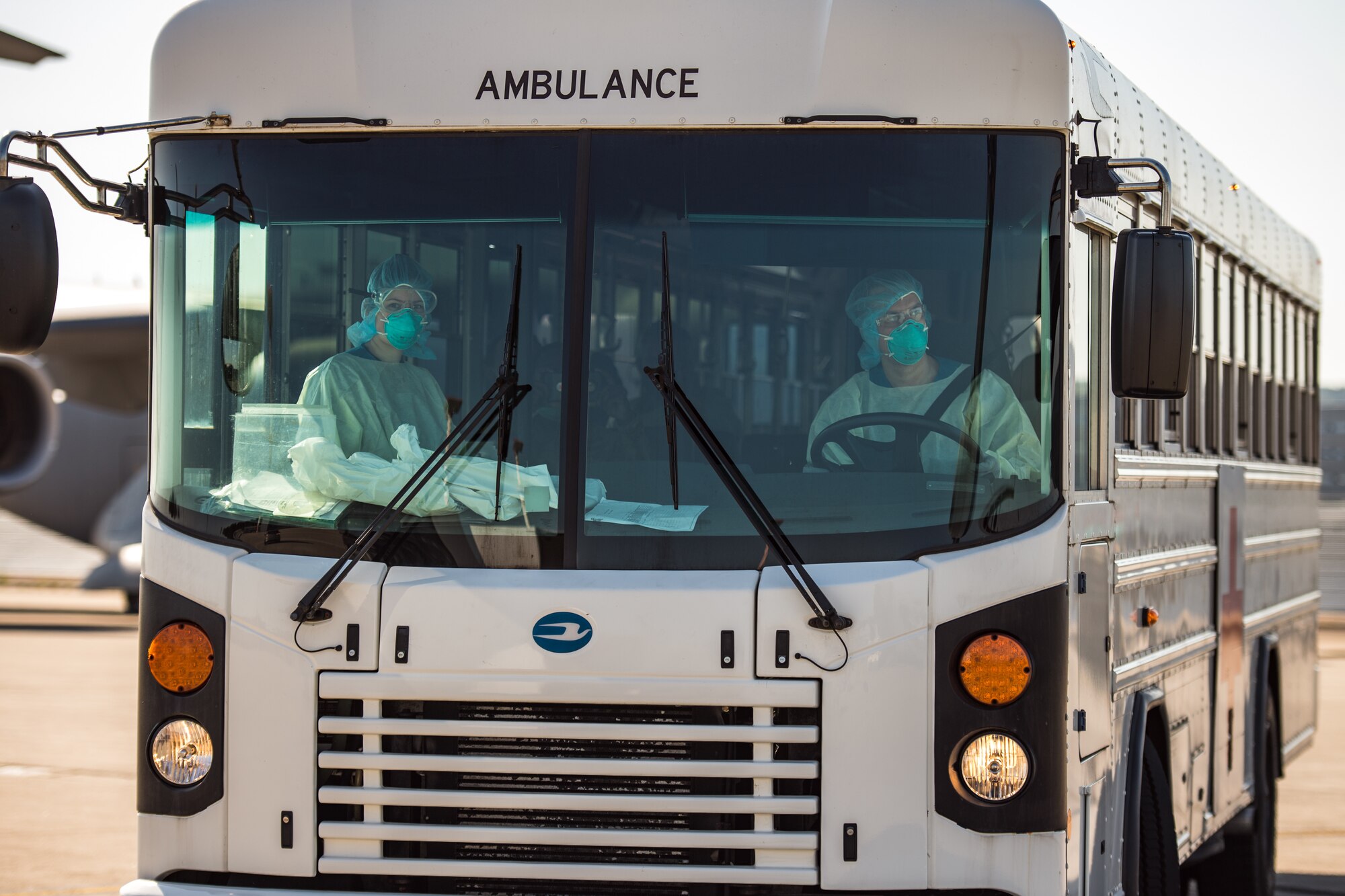 U.S. Air Force medical personnel transfer COVID-19 patients from the flightline at Ramstein Air Base, Germany, to Landstuhl Regional Medical Center, May 16, 2020.