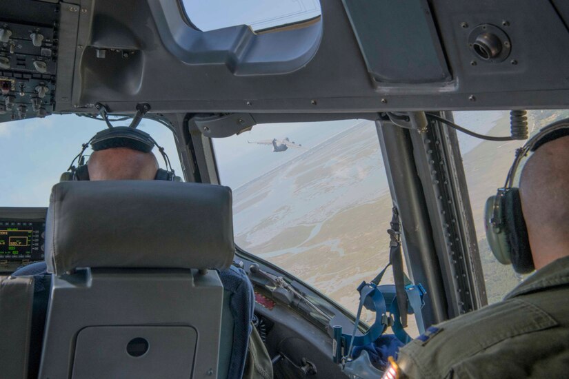 Joint Base Charleston Airmen from the 315th Airlift Wing and 437th Airlift Wing fly C-17 Globemaster III’s over wetlands around Charleston, South Carolina, May 15, 2020. The flyover went over medical facilities in Downtown Charleston as part of OPERATION: AMERICA STRONG, a Salute to medical workers and first responders on the ground.