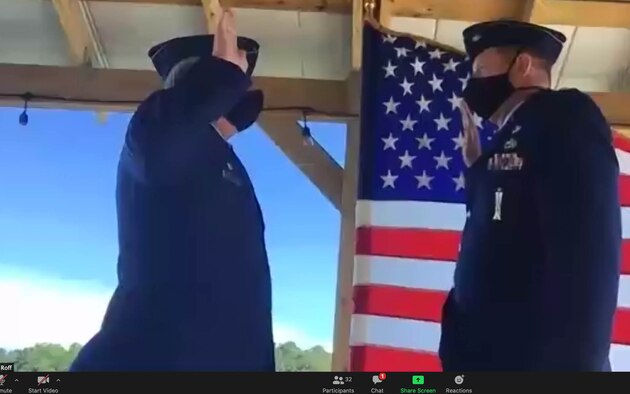 Col. Tom Walter, left, 315th Maintenance Group Commander, Joint Base Charleston, S.C. re-administered the oath of office to Col. William Roff, newly named Readiness and Integration Organization Commander of Detachment 8, Stuttgart, Germany May 15, 2020, via virtual video. The unit training assembly (UTA) was held virtually in May due to COVID-19