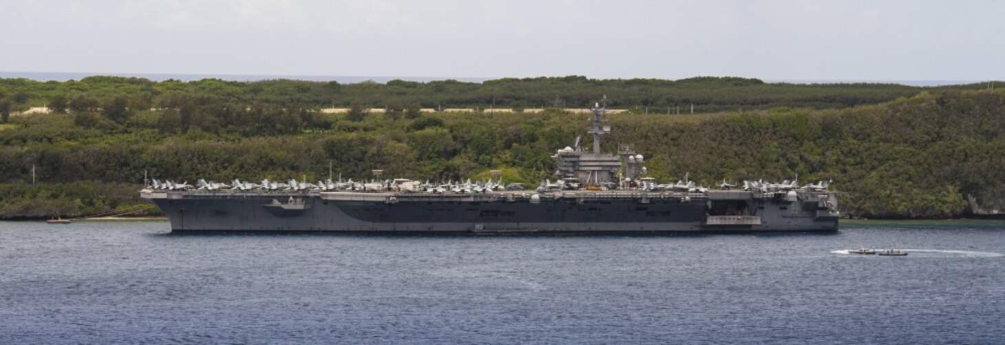 NAVAL BASE GUAM (May 15, 2020) The aircraft carrier USS Theodore Roosevelt (CVN 71) is moored pier side at Naval Base Guam May 15, 2020. Theodore Roosevelt's COVID-negative crew returned from quarantine beginning on April 29 and is making preparations to return to sea to continue their scheduled deployment to the Indo-Pacific.