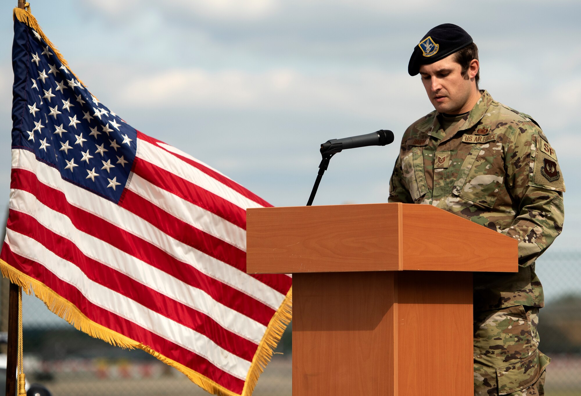 Tech Sgt. Alex Baron, a Military Working Dog handler assigned to the 48th Security Forces Squadron, reads the MWD poem ‘Guardians of the Night’ during the final guardmount in honor of National Police Week at Royal Air Force Lakenheath, England, May 15, 2020. National Police Week recognizes the service and sacrifice of law enforcement officers, paying special tribute to those who have lost their lives in the line of duty for the safety and protection of others. (U.S. Air Force photo by Airman 1st Class Jessi Monte)