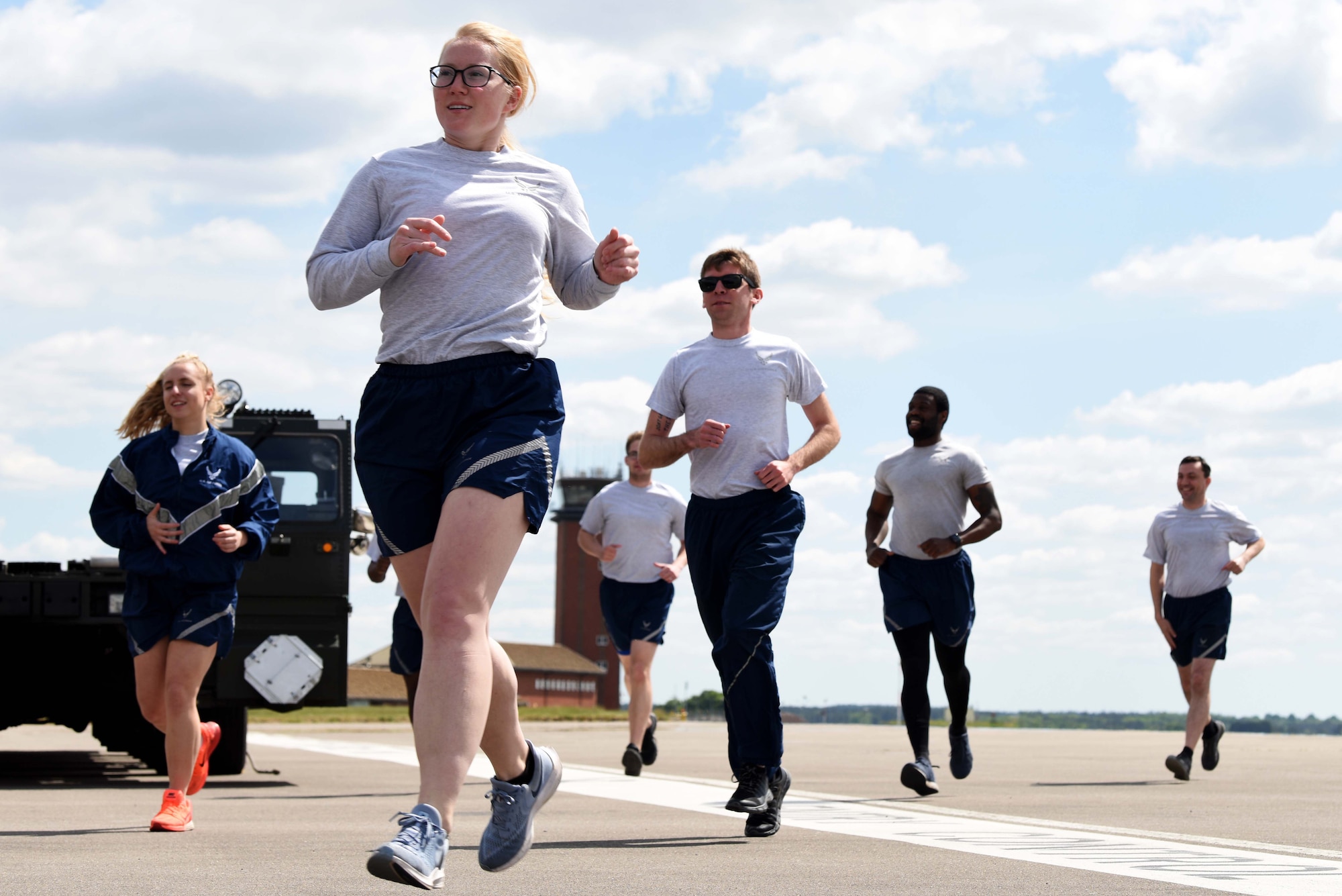 Airmen from the 727th Air Mobility Squadron participate in the annual Port Dawg Memorial Run at RAF Mildenhall, England, May 15, 2020. The Port Dawg Memorial Run is an annual event that is career field-wide for air transportation Airmen and is held at aerial ports around the world during Transportation Week. (U.S. Air Force photo by Senior Airman Brandon Esau)