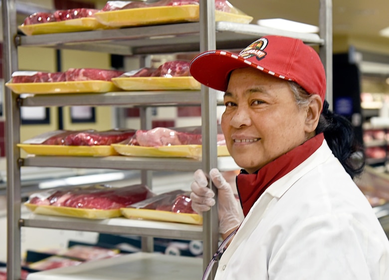 Edith Lowe, a work leader in the meat department at the Tinker Commissary, has worked here for almost 20 years.