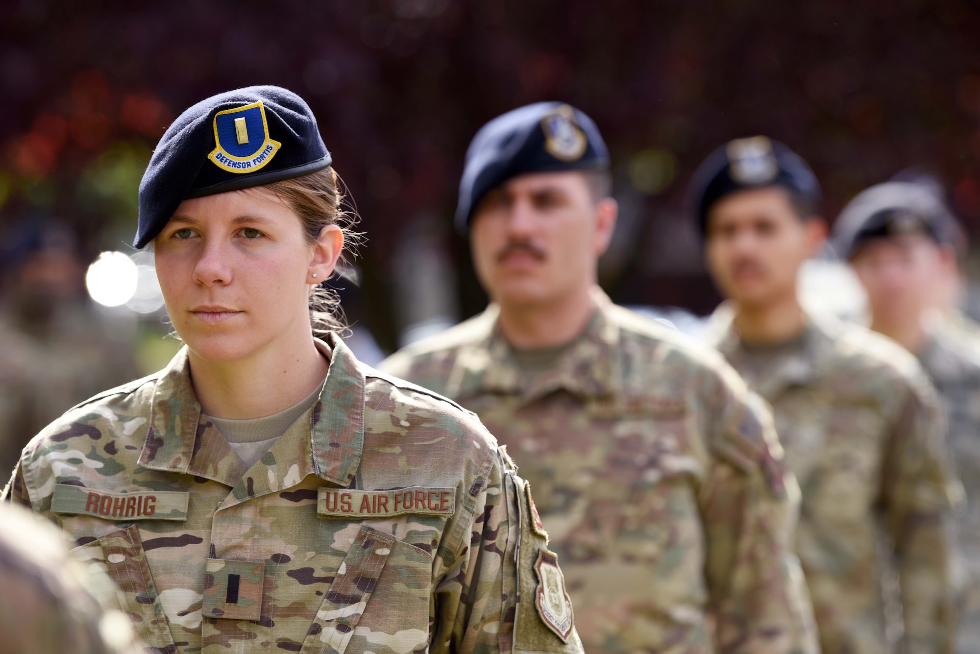 First Lieutenant Jessica Rohrig, 100th Security Forces Squadron operations officer, stands at attention during the 100th SFS Police Week closing ceremony at RAF Mildenhall, England, May 15, 2020. National Police Week is an observance in the United States which pays tribute to local, state and federal officers who’ve died or who’ve been disabled in the line of duty. (U.S. Air Force photo by Senior Airman Brandon Esau)