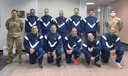 Air Force Echo Flight trainees pose for a picture in the Commandant’s hallway.