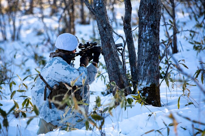 A U.S. Marine posts security on a patrol during exercise Northern Viper on Yausubetsu Training Area, Hokkaido, Japan, Feb. 2, 2020.